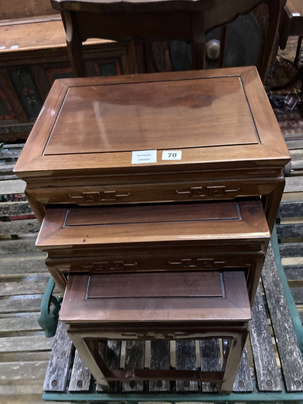 A nest of three Chinese hardwood occasional tables, largest 45 x 31cm height 59cm